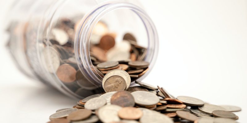 A spilled jar of coins