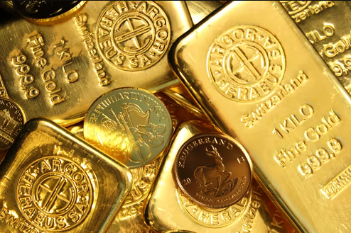 Shiny gold bars and coins