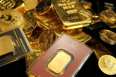 A picture of gold coins, gold biscuits, and gold bullion bars