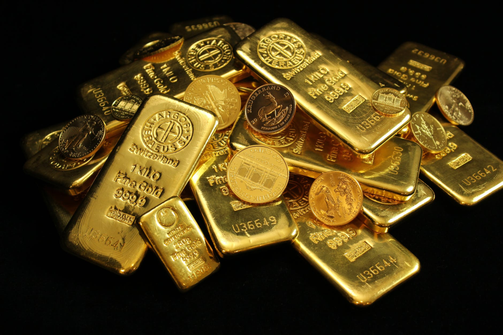 a-pile-of-gold-bars-and-coins