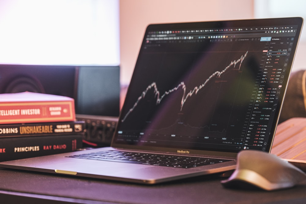 Stock market analysis on a laptop screen
