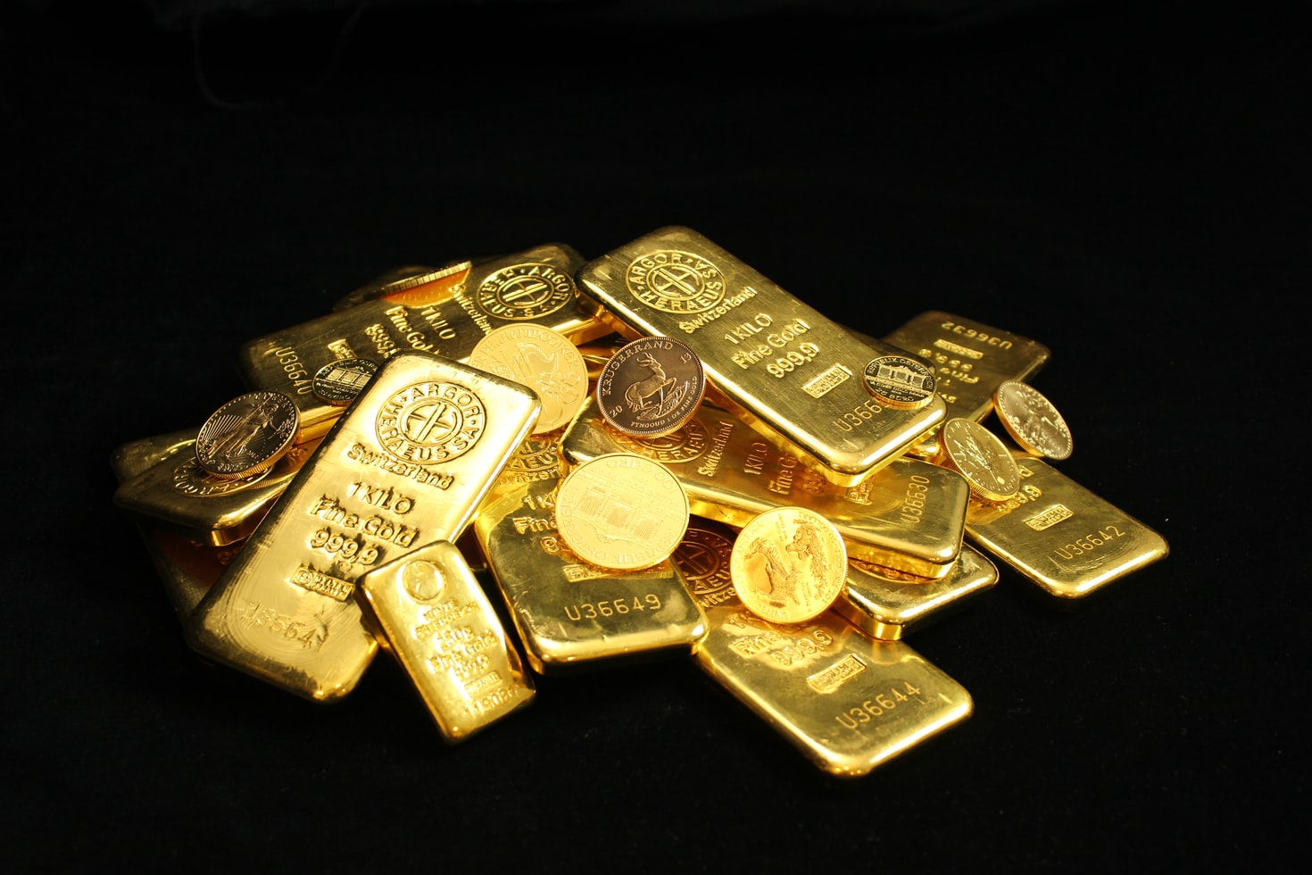 A stack of gold bars stored in an IRA account