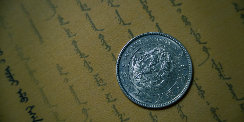 A silver coin placed on a paper