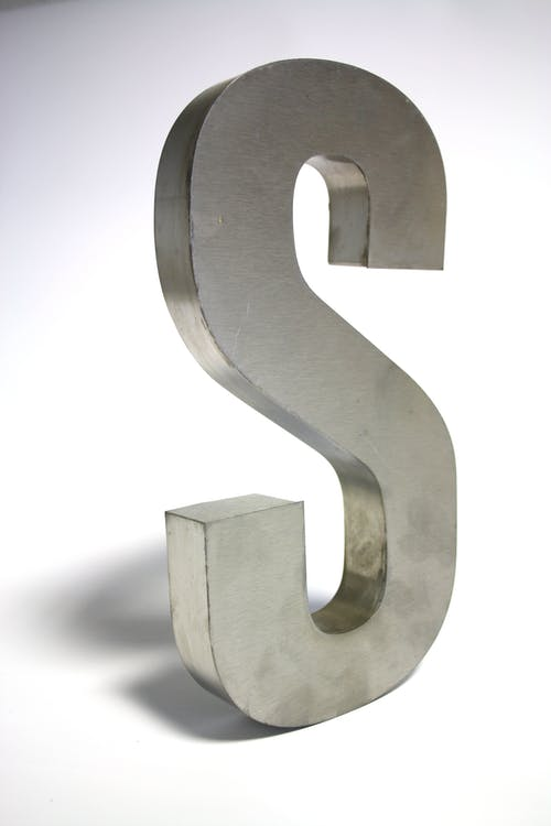 A dollar sign made from silver