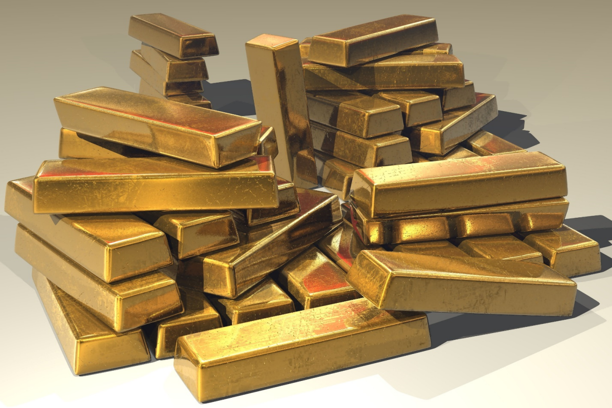 Piles of gold bars.