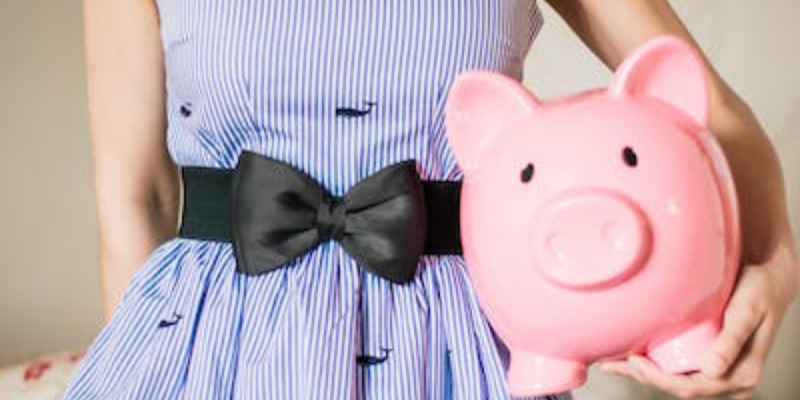 A child holding a piggy bank