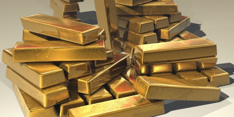 Gold bars stacked on top of one another