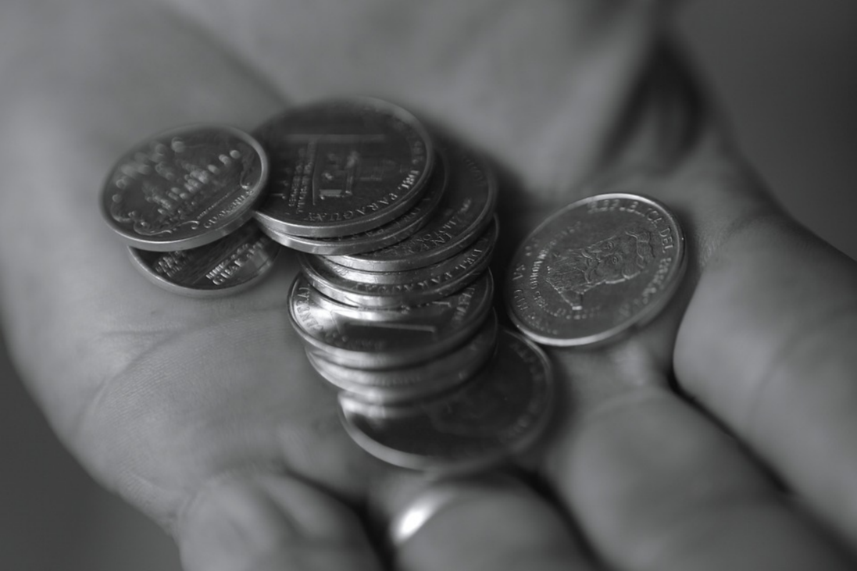 An investor holding silver coins