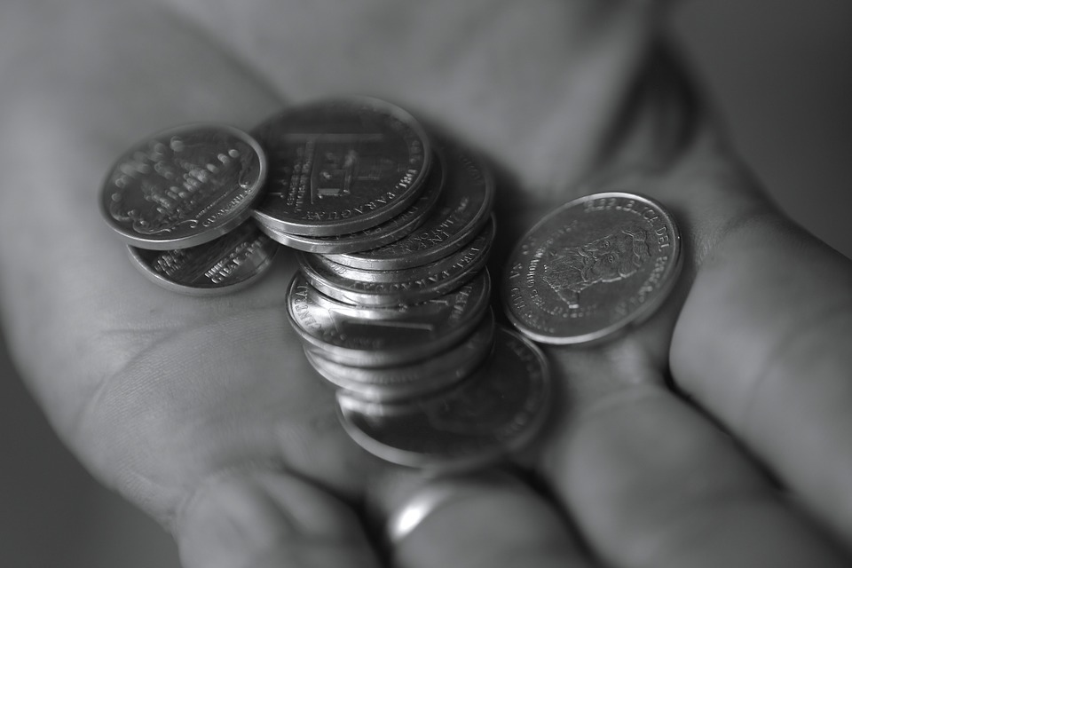 An investor holding silver coins
