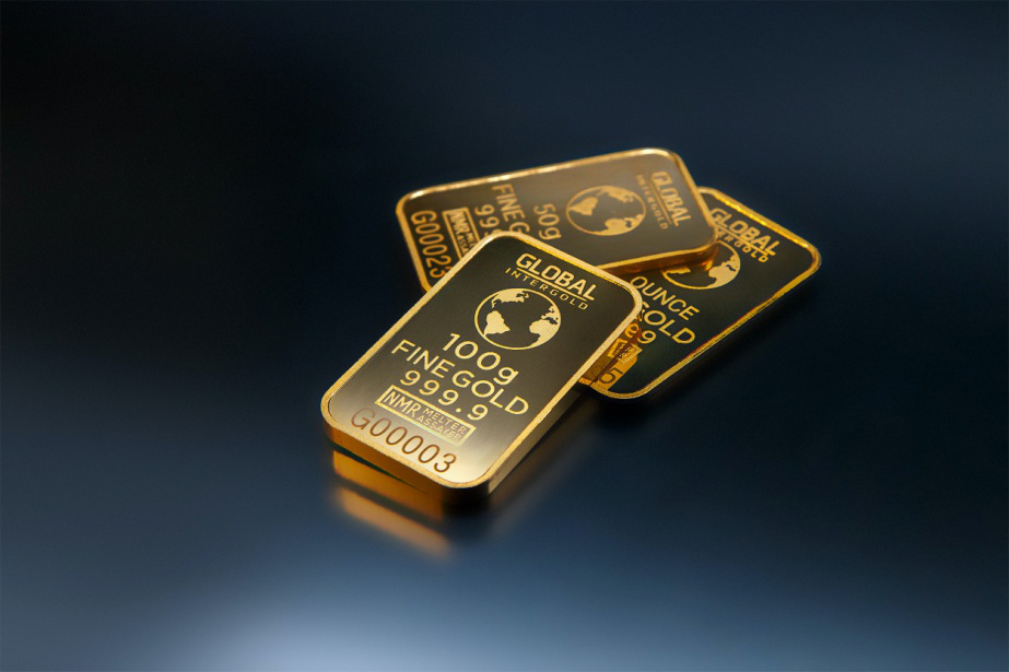 Three gold bars with identifiers on them.
