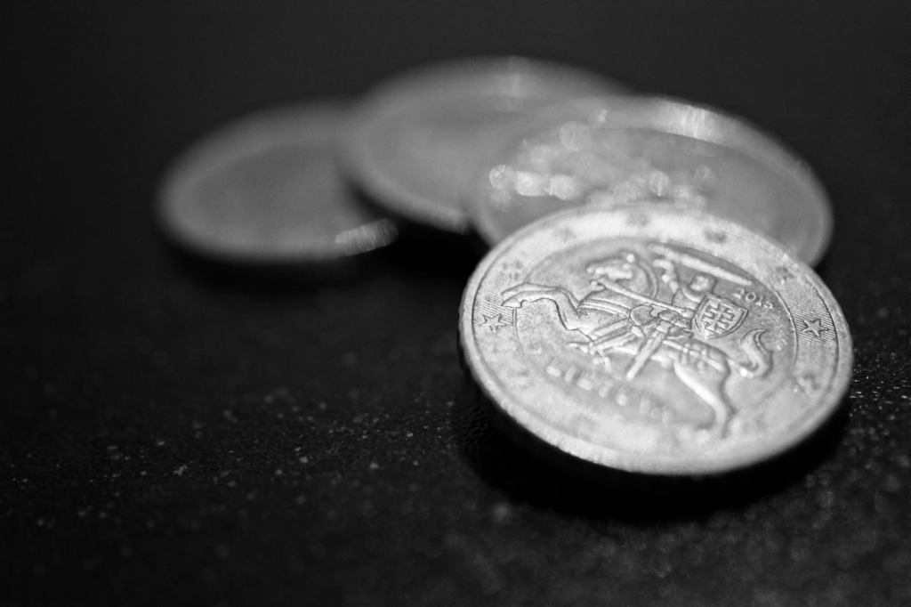 A Close-Up of Four Silver-Colored Coins