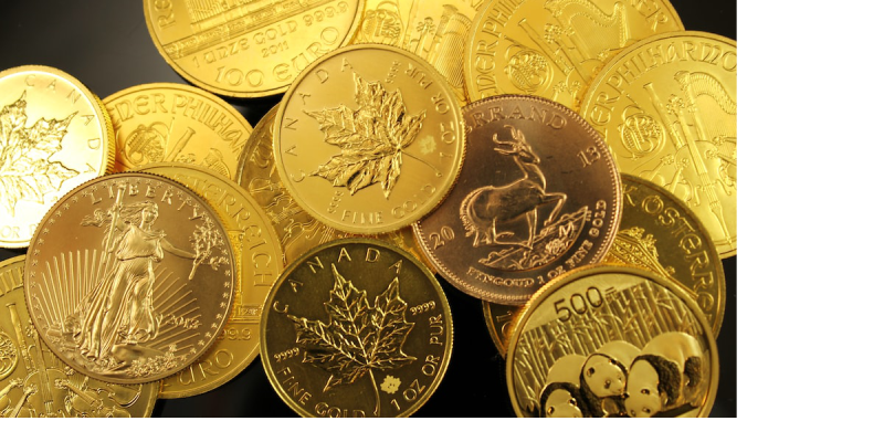 Pile of gold bullion coins from Royal Canadian Mint, US Mint,